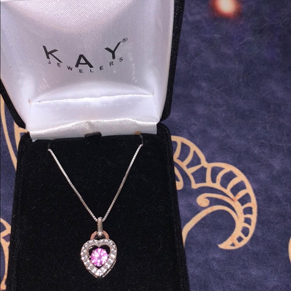 Dancing diamond necklace with rose gold lock